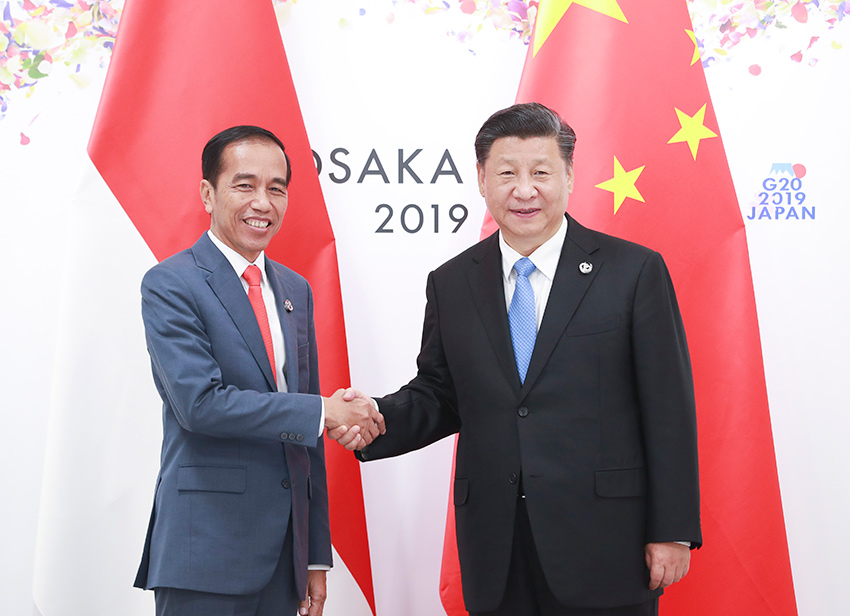 6月28日，國(guó)家主席習(xí)近平在大阪會(huì)見(jiàn)印度尼西亞總統(tǒng)佐科。 新華社記者 龐興雷 攝