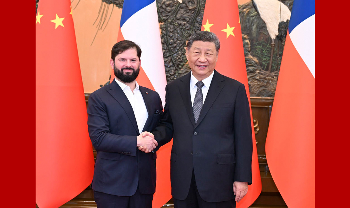 習近平會見智利總統博裡奇